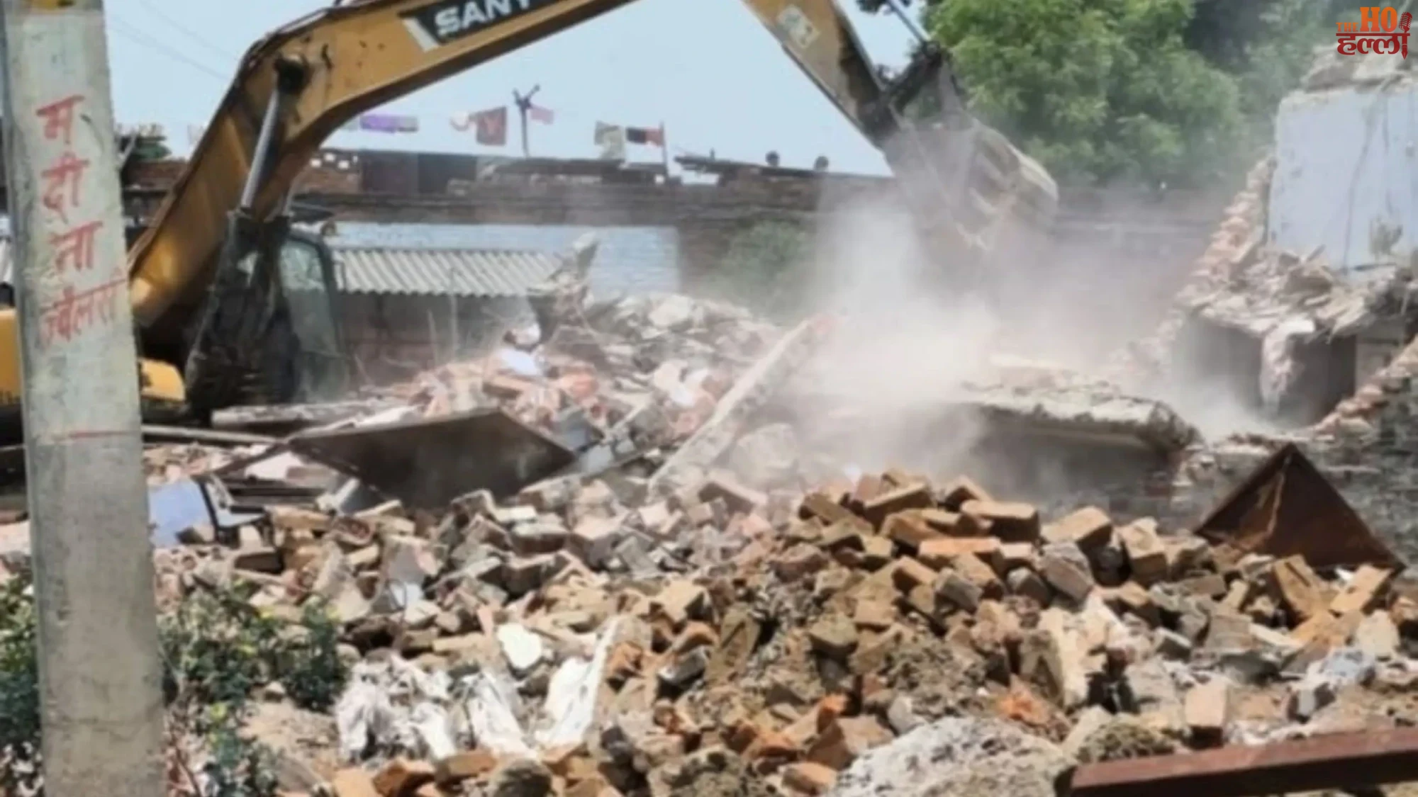 Bulldozer Action on Pond Land 36 Houses Demolished